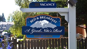 A sign for a bed and breakfast named "A Good Nite's Rest" in Banff, Alberta, with a vacancy notice. - A Good Nite's Rest Bed and Breakfast (Banff)