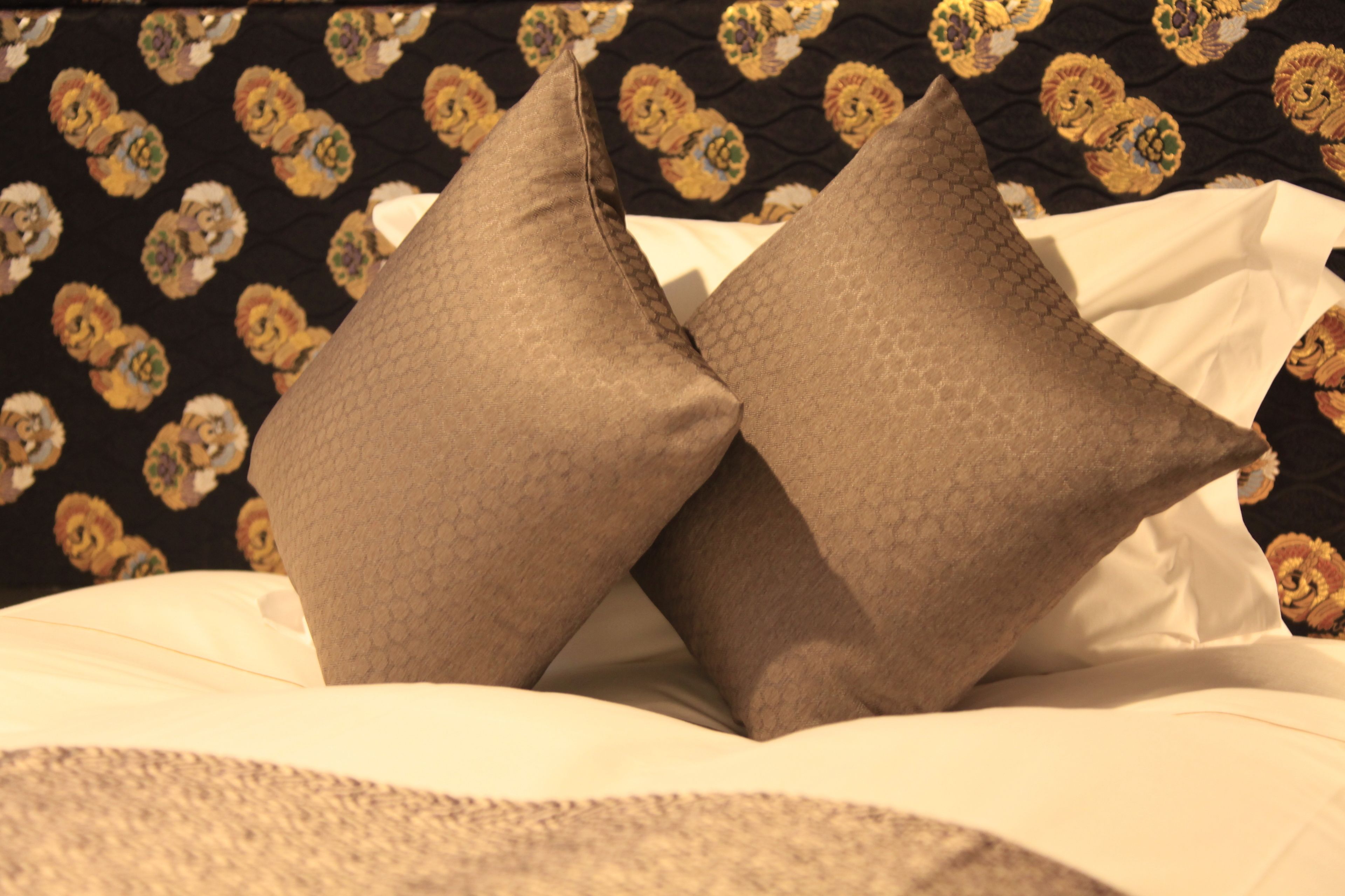 premium bedding, blackout curtains, free wifi, bed sheets