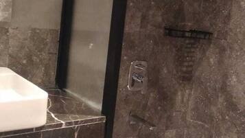 Shower, free toiletries, hair dryer, slippers