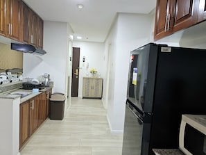 Fridge, electric kettle, eco-friendly cleaning products, freezer