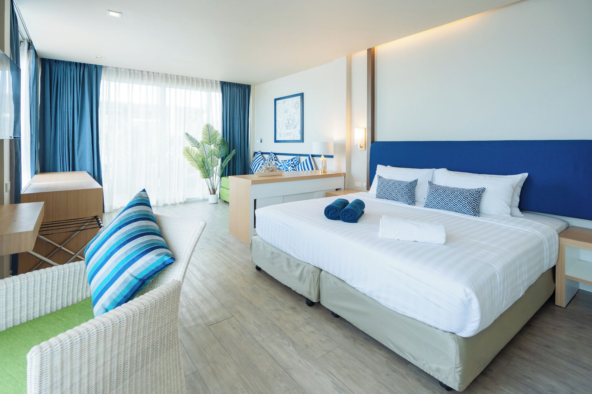 Premier Triple Room, Sea View | In-room safe, desk, laptop workspace, blackout drapes