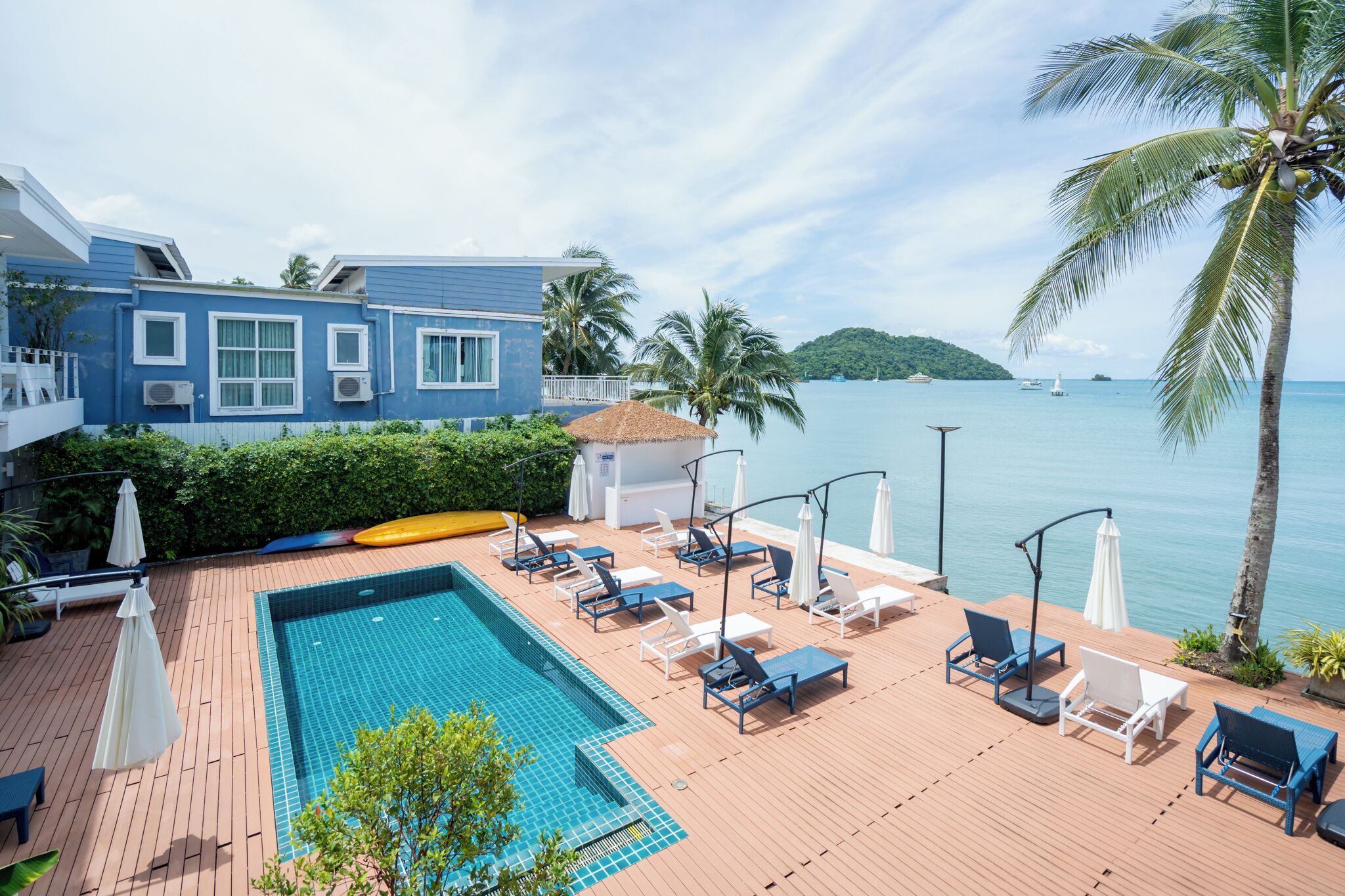 outdoor pool, open 7:00 am to 10:00 am, pool umbrellas, pool loungers