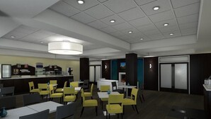 A modern restaurant with yellow chairs, white tables, and a central counter. - Holiday Inn Express & Suites Thunder Bay by IHG (Thunder Bay)