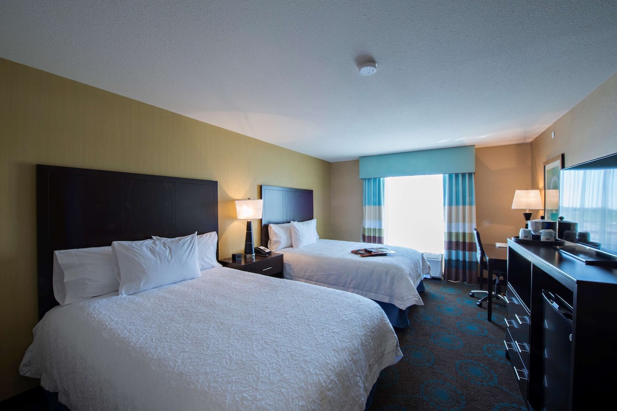 Room, 2 Queen Beds, Refrigerator & Microwave | In-room safe, desk, laptop workspace, blackout drapes