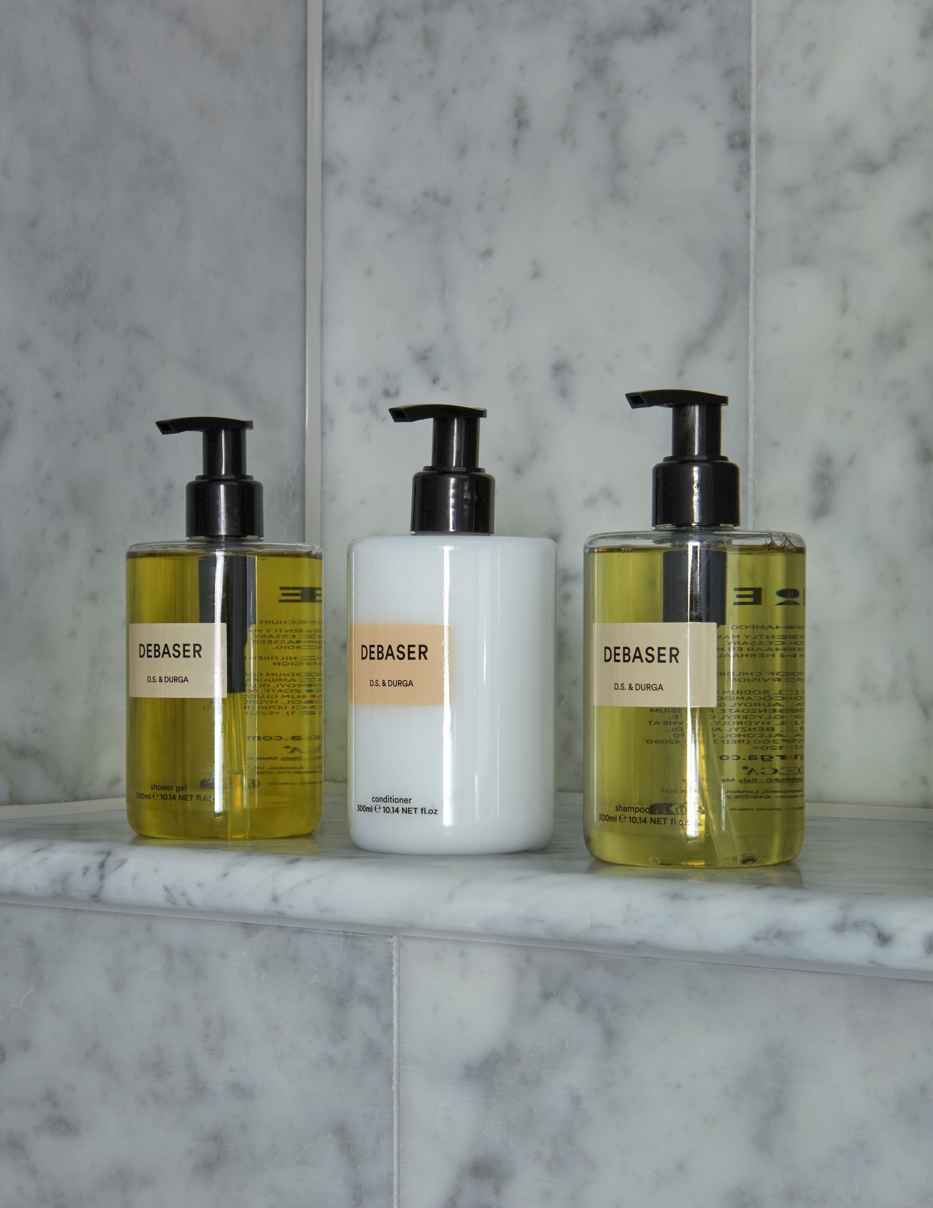 designer toiletries, hair dryer, bathrobes, slippers