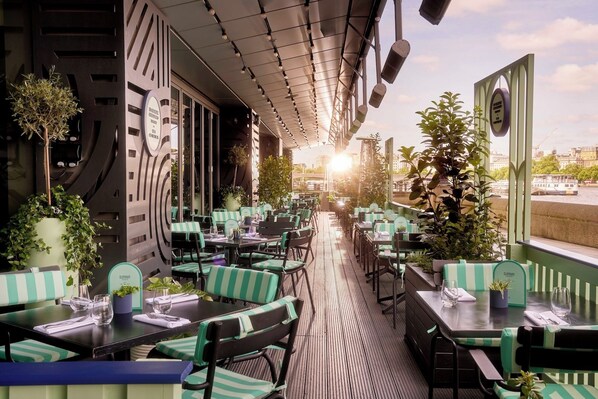 Breakfast, lunch, dinner served; British cuisine, al fresco dining 