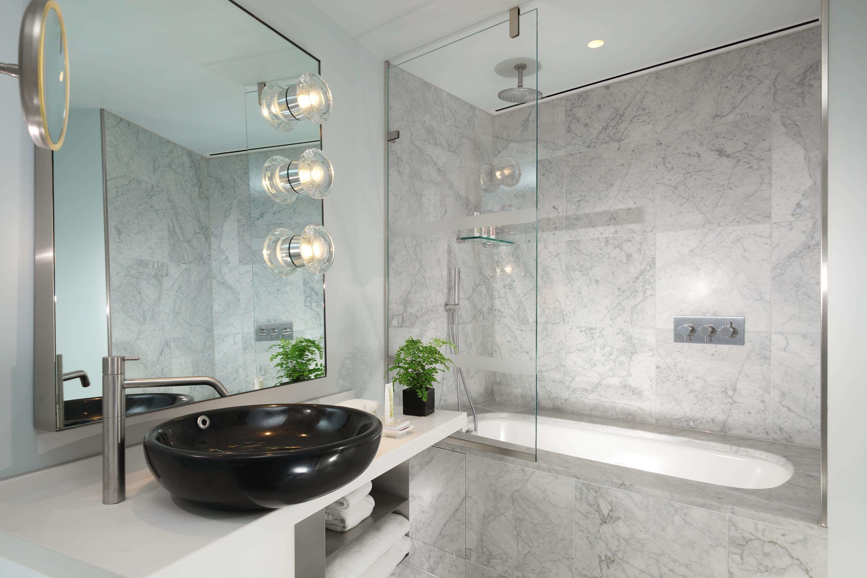 designer toiletries, hair dryer, bathrobes, slippers