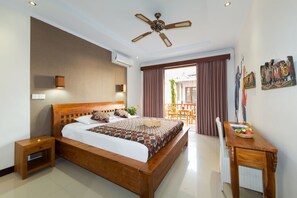 Habitación Deluxe | Caja de seguridad en la habitación, escritorio, cunas y camas extra 