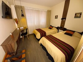 Habitación Deluxe doble, 2 camas individuales | Caja fuerte, wifi gratis, ropa de cama