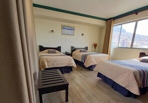 Deluxe Triple Room, 3 Twin Beds, City View | In-room safe, free WiFi, bed sheets - Hotel Sagarnaga (La Paz)