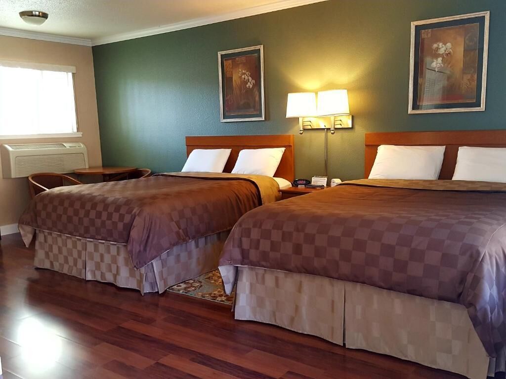 individually decorated, individually furnished, desk, blackout curtains