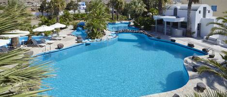 Outdoor pool, pool umbrellas, sun loungers