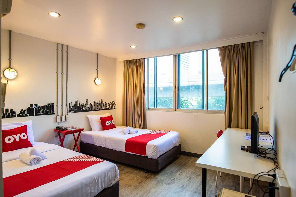 Chambre Deluxe avec lits jumeaux | Coffre-fort, accès au Wi-Fi (inclus)