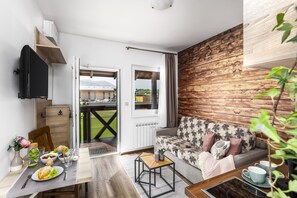 Apartment, 1 Bedroom | Living area | 32-inch LCD TV with satellite channels, TV - Hilson Apartments Jasná (Liptovsky Mikulas)