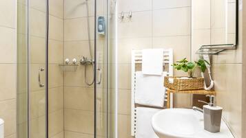 Shower, free toiletries, hair dryer, towels