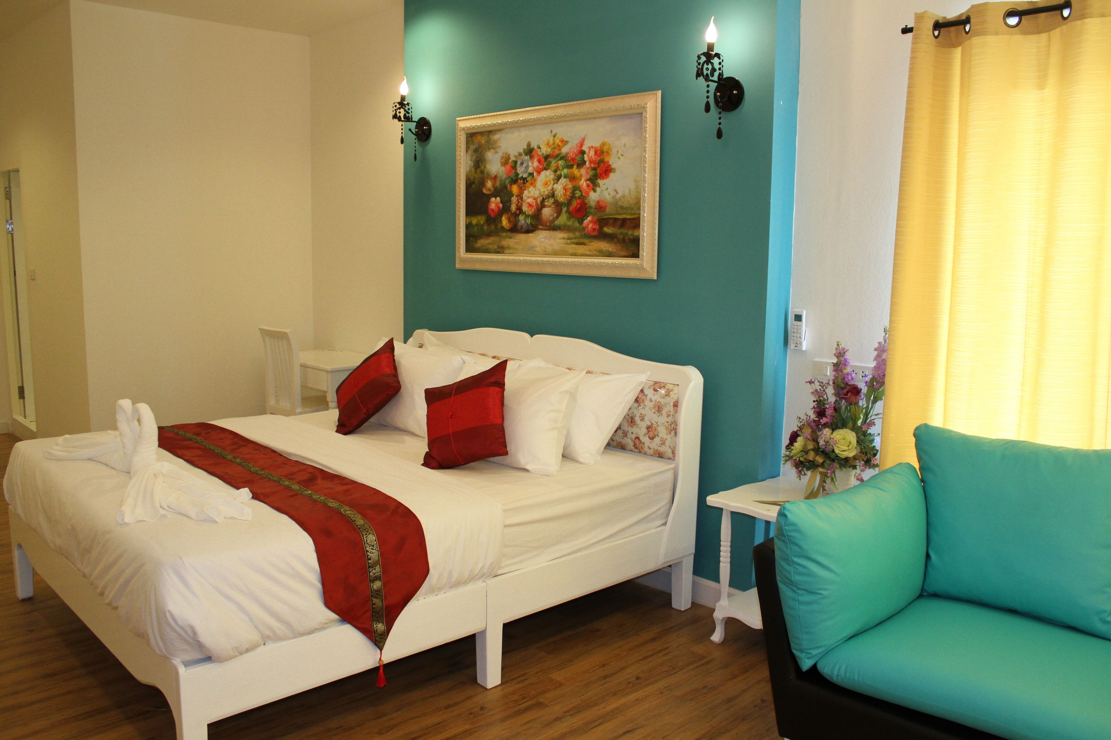 jasmine suite | premium bedding, desk, laptop workspace, rollaway beds