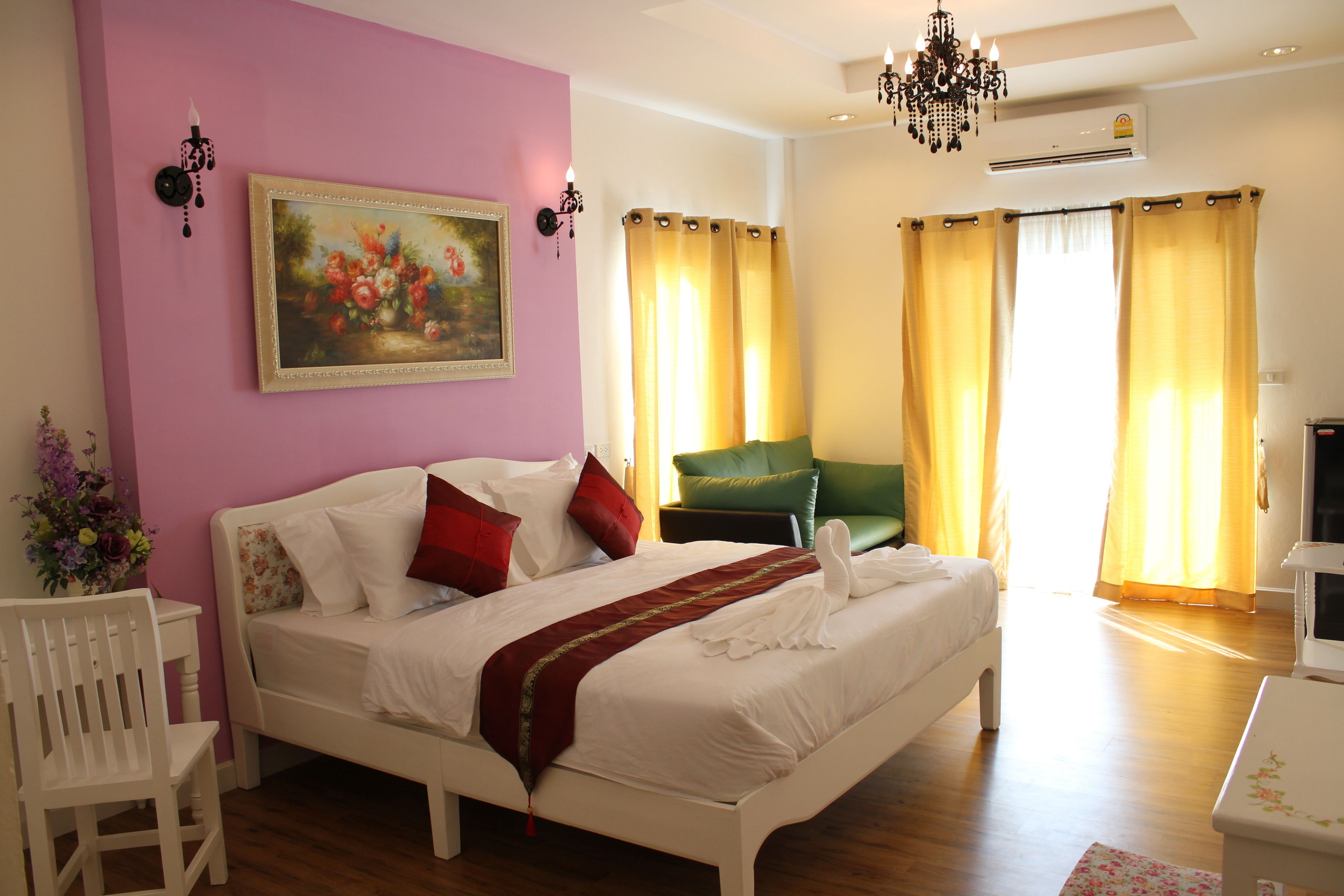 premium bedding, desk, laptop workspace, rollaway beds