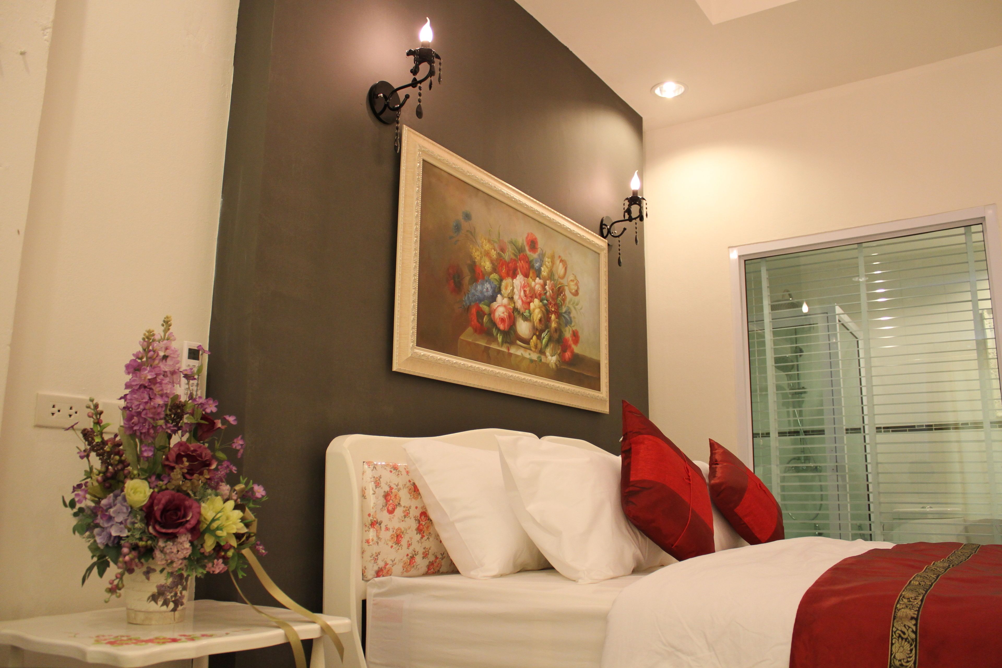 premium bedding, desk, laptop workspace, rollaway beds