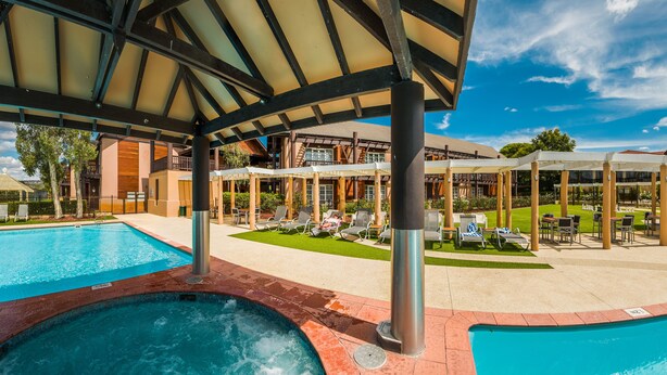 A pool area with multiple pools, lounge chairs, and a covered seating area. - The Sebel Swan Valley The Vines (The Vines)