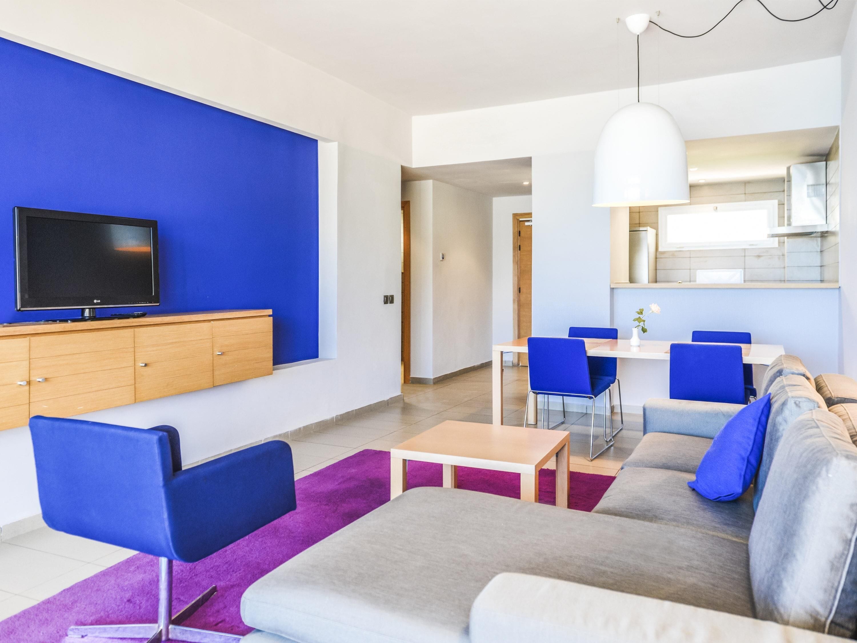 Apartment, 1 Bedroom, Balcony, Sea View | In-room safe, desk, blackout drapes, soundproofing