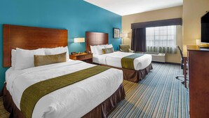 A hotel room with two beds, a desk, a chair, a TV, and a large window. - Best Western Plus Patterson Park Inn (Arkansas City)