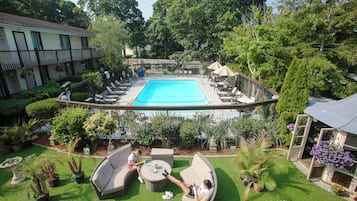 Seasonal outdoor pool, pool umbrellas, pool loungers