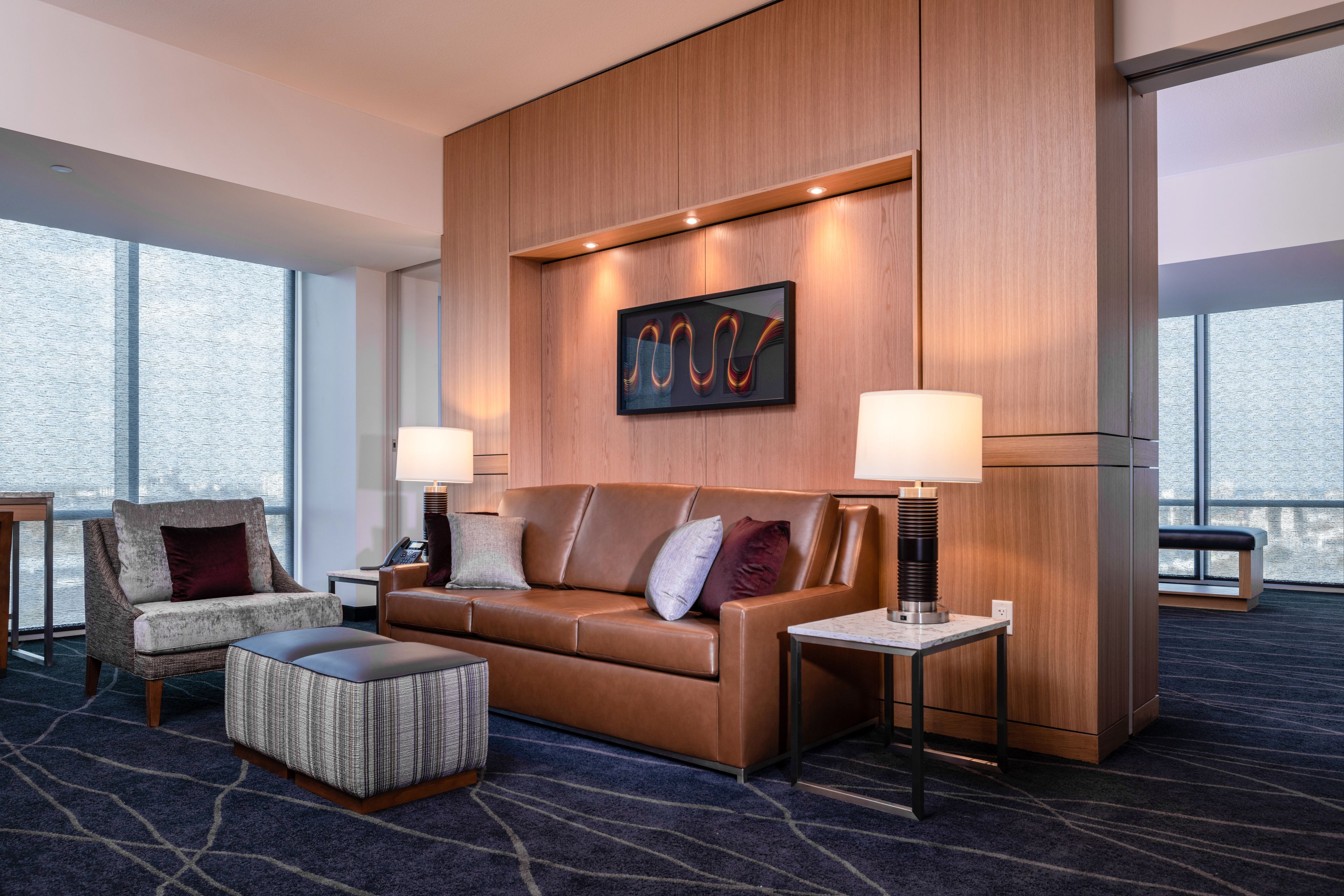 luxury suite, corner | living room | 42-inch flat-screen tv with cable channels, tv, ipod dock