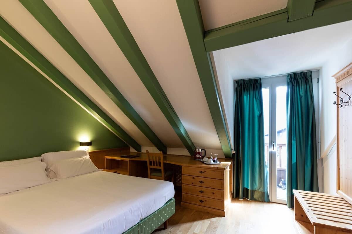 Suite junior | Ropa de cama hipoalergénica y minibar