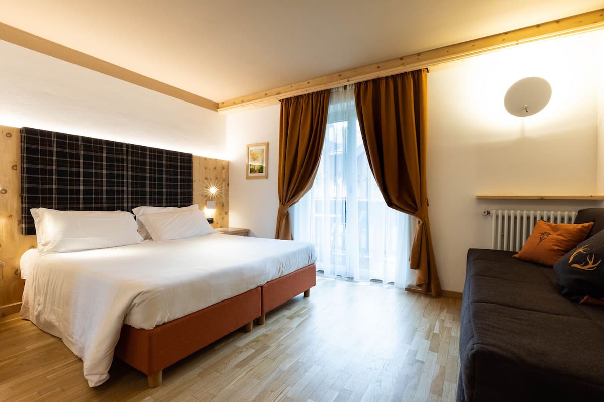 Habitación triple estándar | Ropa de cama hipoalergénica y minibar