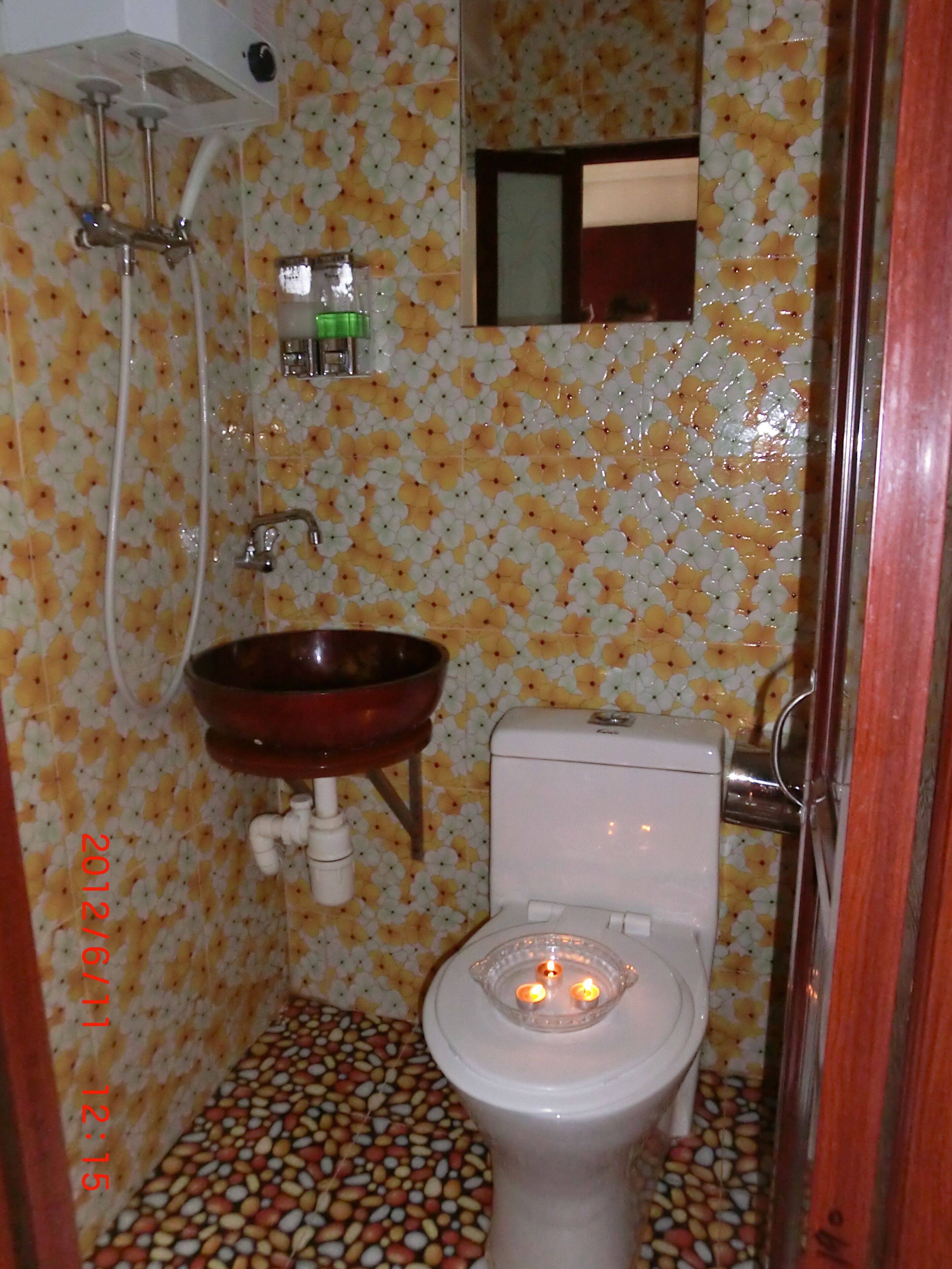 Shower, hair dryer, slippers, towels