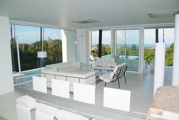 Villa, 4 Bedrooms | Living room | 50-inch flat-screen TV with satellite channels, TV, DVD player
