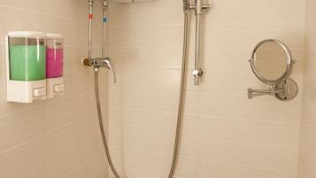 Shower, free toiletries, hair dryer, slippers