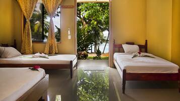 Deluxe Quadruple Room, Ocean View | Bed sheets