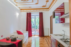 Apartment, 1 Bedroom, Terrace | Living area | Flat-screen TV