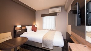 A hotel room with a bed, a TV, a window with curtains, an air conditioner, and a small table. - Hotel MyStays Gotanda (Tokyo)