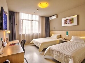 A hotel room with two beds, a desk, a chair, a TV, and a window with curtains. - Jinjiang Inn Outlets Plaza,jishigang, Ningbo (Ningbo)