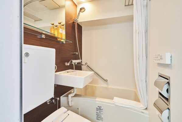 Ensemble douche/baignoire, articles de toilette gratuits, sèche-cheveux