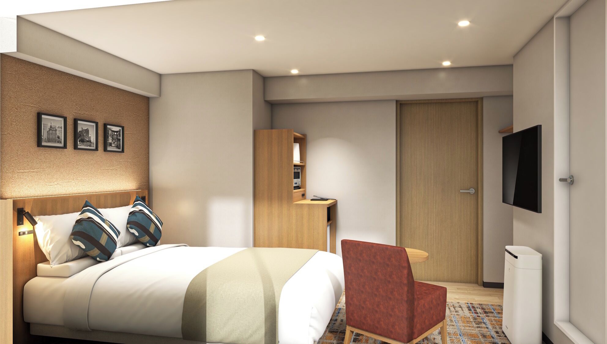A modern hotel room with a bed, a desk, a chair, a wardrobe, a TV, and a waste bin.