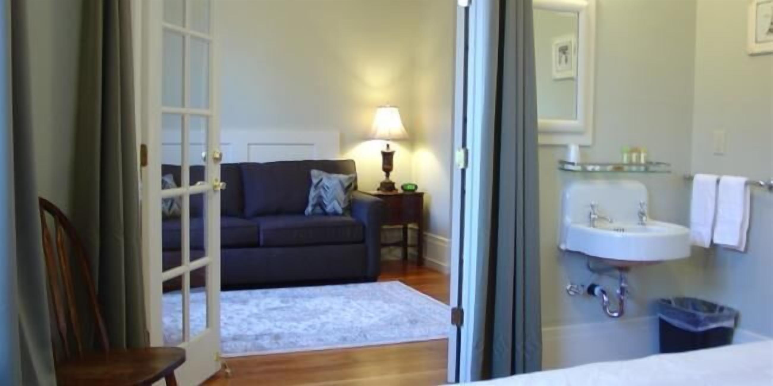 suite, 1 king bed with sofa bed (w/ marble shower) | living area