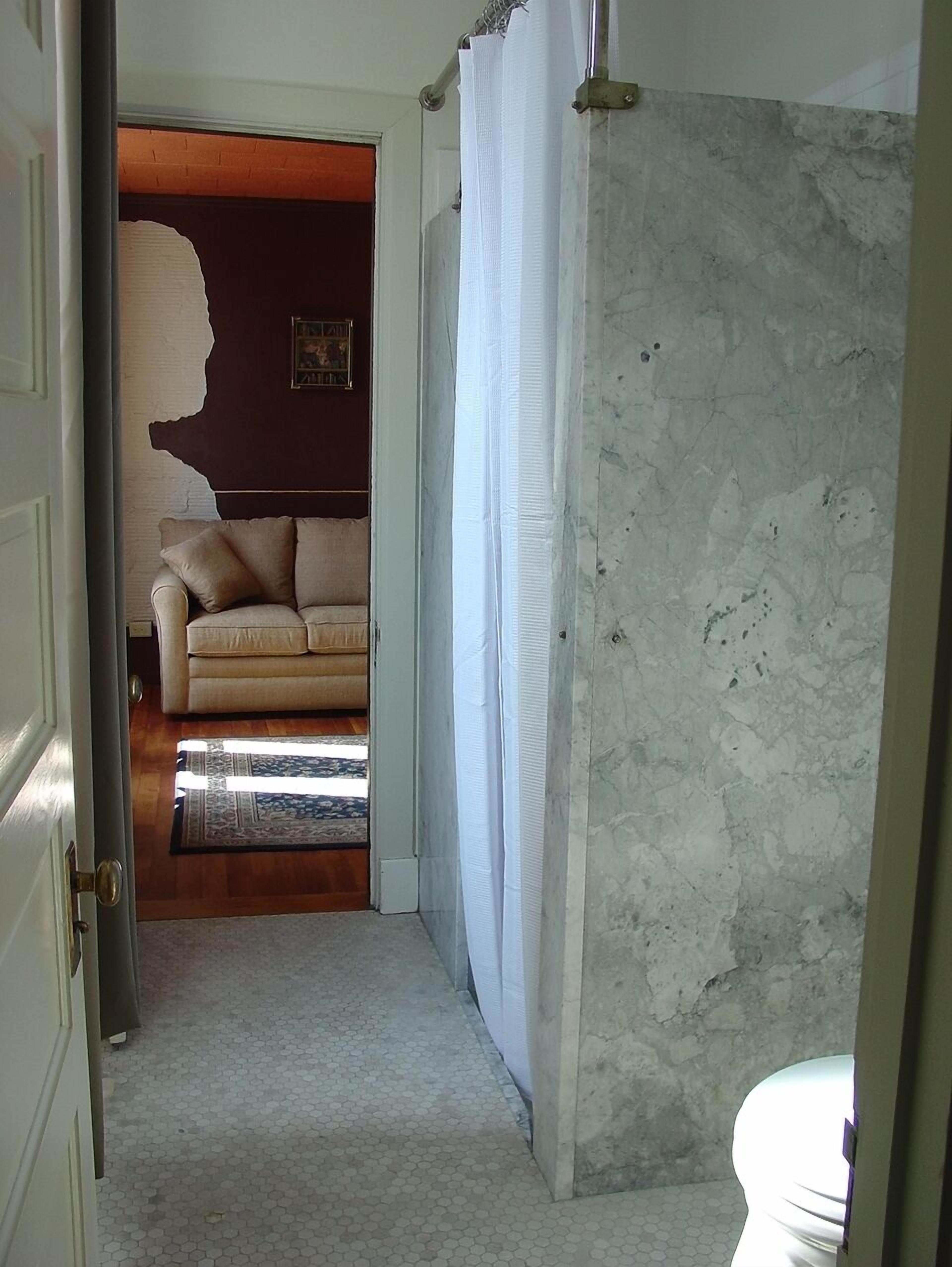 suite, 1 king bed with sofa bed (w/ marble shower) | bathroom | free toiletries, hair dryer, bathrobes, towels