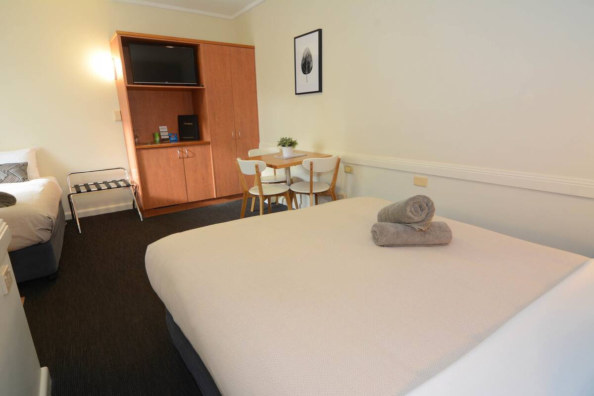 Desk, blackout drapes, iron/ironing board, cribs (surcharge)