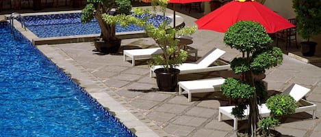 Outdoor pool, pool umbrellas, pool loungers