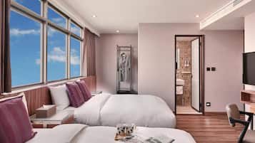 Chambre Quadruple Deluxe, 2 lits doubles | Vue de la chambre