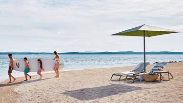 Private beach, sun loungers, beach umbrellas, beach bar