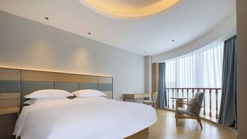 Premium bedding, down duvets, desk, laptop workspace