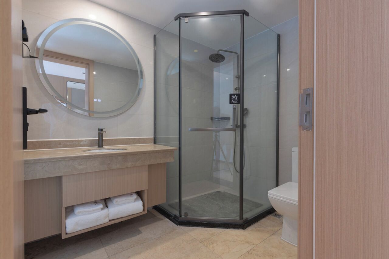 comfort twin room | premium bedding, down duvets, desk, laptop workspace