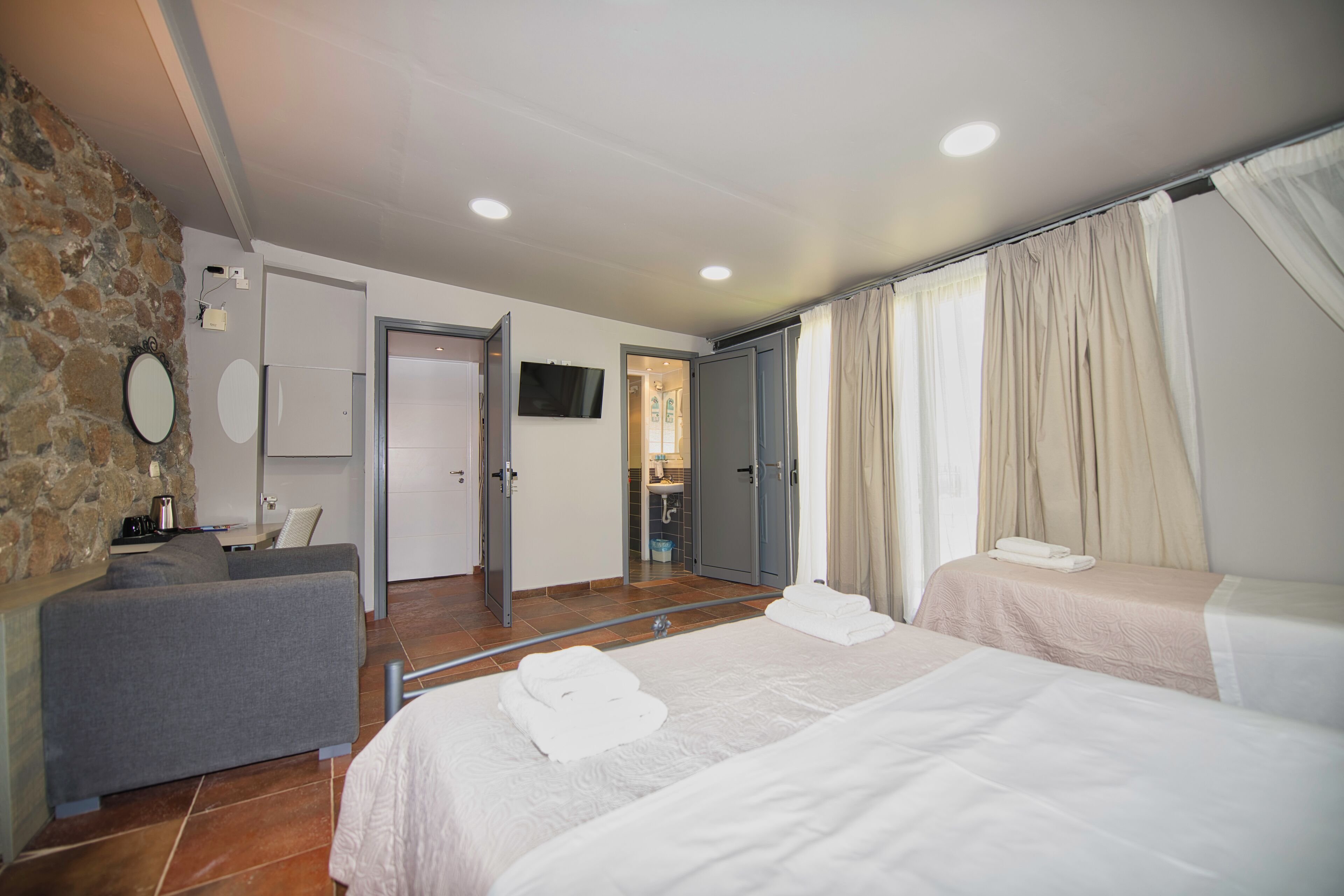 family room, garden view | 1 bedroom, premium bedding, in-room safe, desk