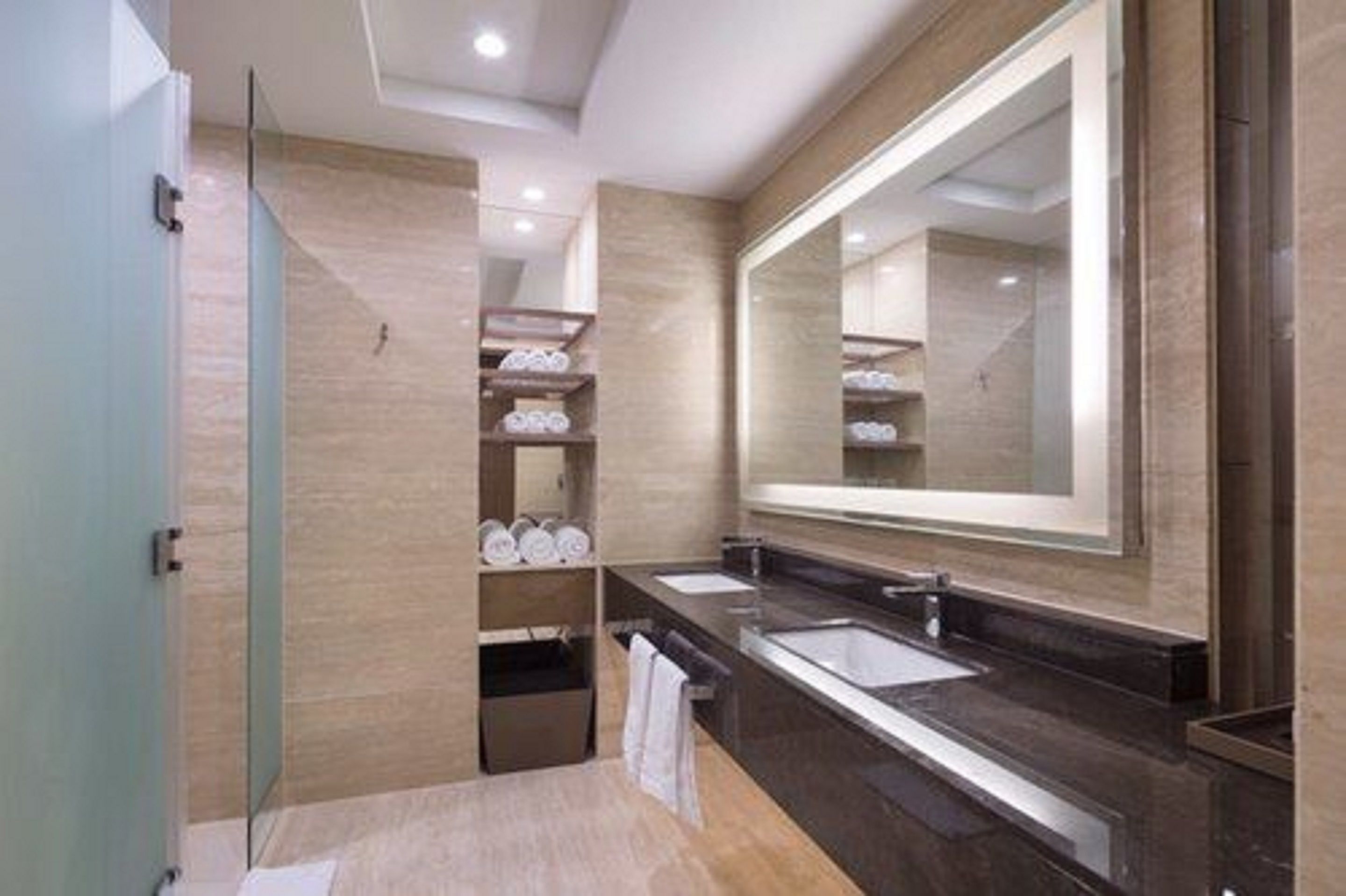 designer toiletries, hair dryer, towels