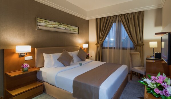 Coffres-forts dans les chambres, fer et planche à repasser