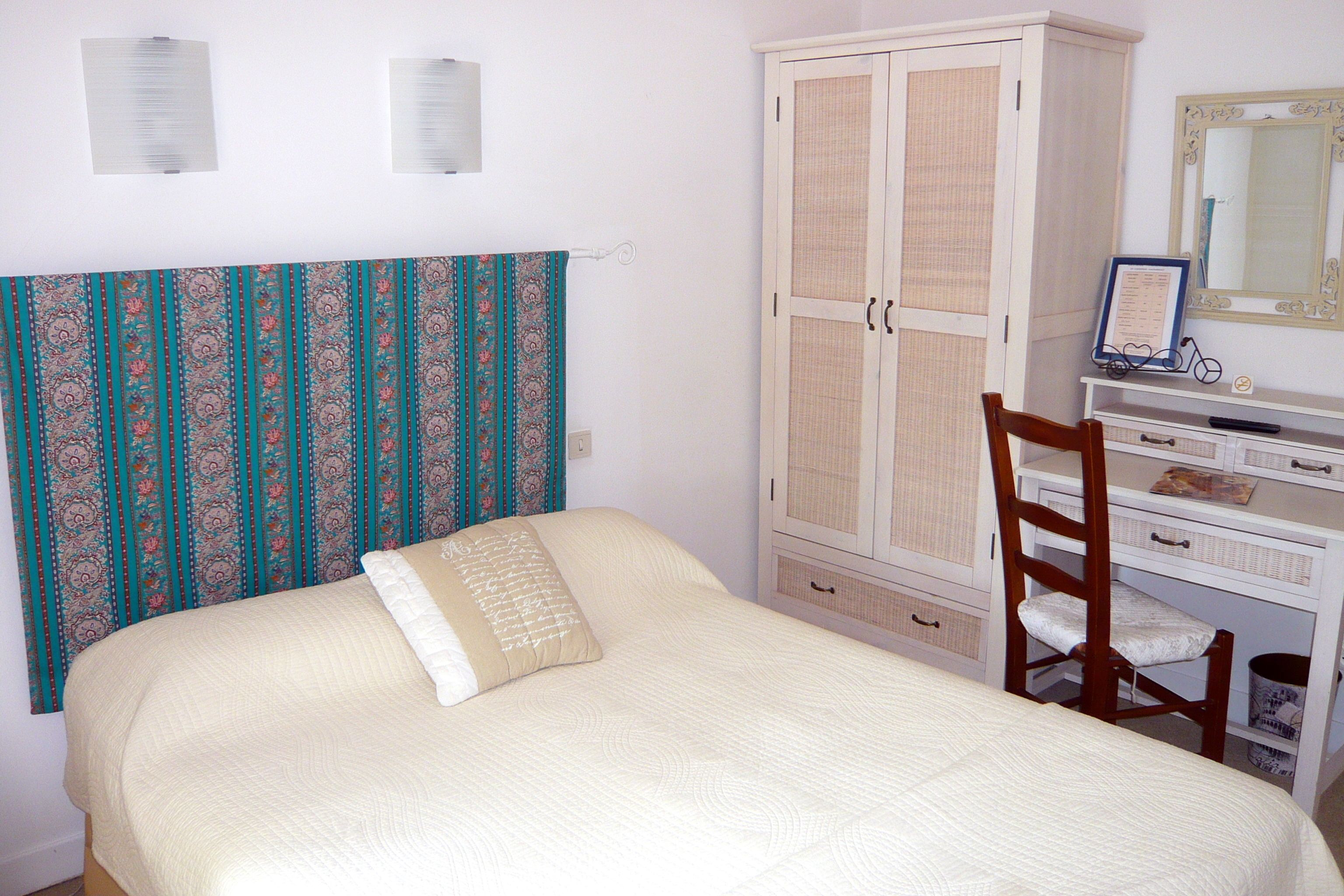 standard double room | in-room safe, individually decorated, desk, blackout curtains